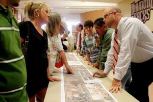 Photo By Pin Lim/Freelance:  Robert Doty of CDM Smith takes notes and answers questions about the proposed improvements to Bailey Road from FM 1128 to Veterans Drive in Pearland.