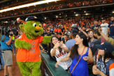 Orbit has fun with some fans (Photo: Chris Daigle)